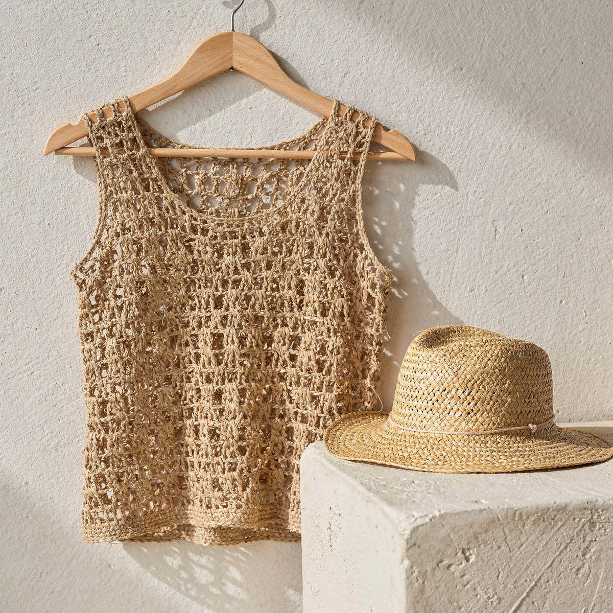 Hand-crocheted raffia garments