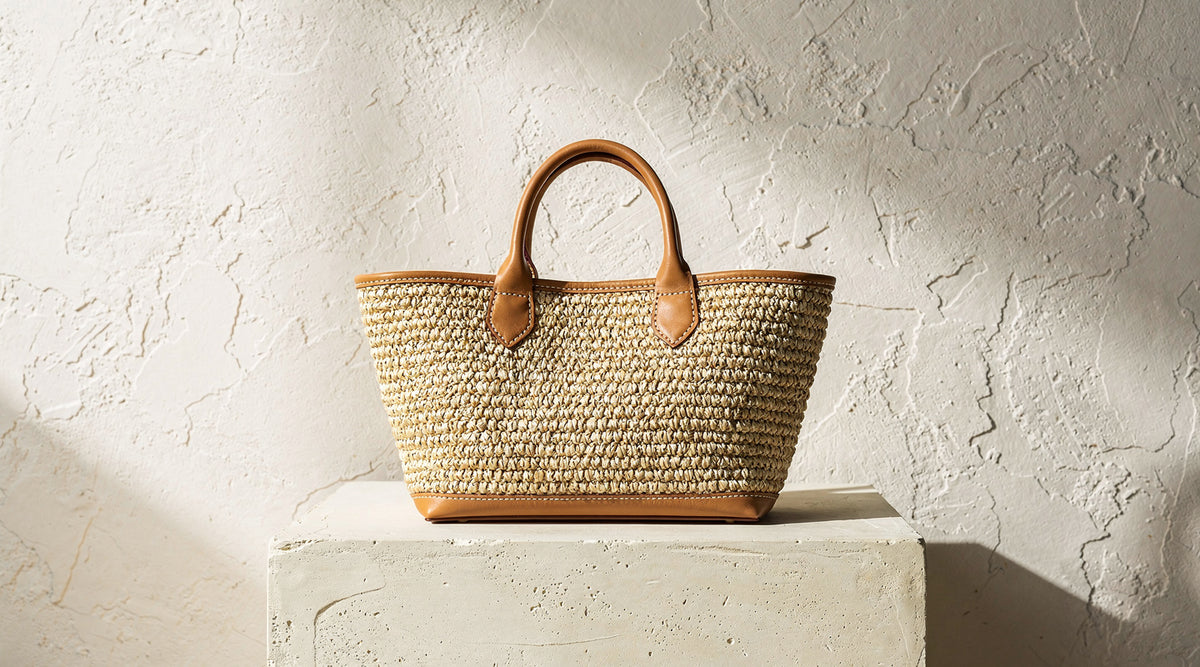 Handwoven raffia bag with leather handles